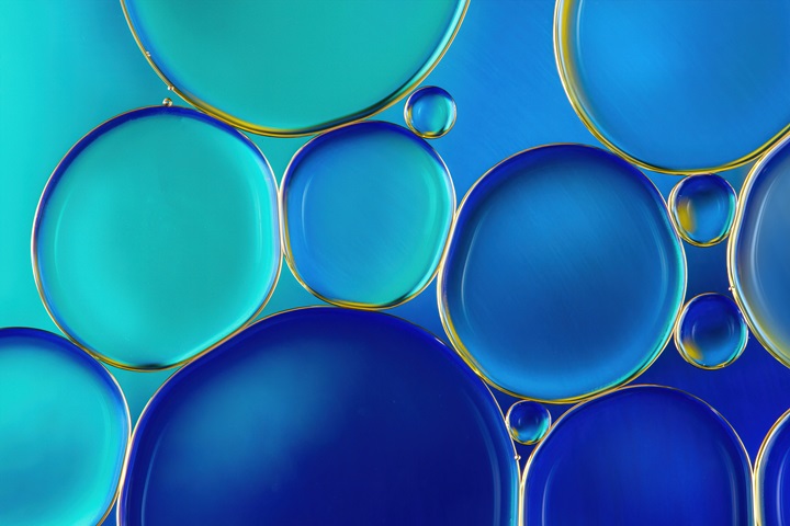 Abstract image of liquid droplets on a blue background