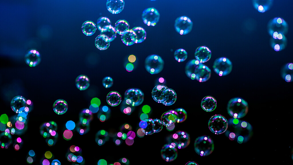 Abstract image showing colourful bubbles on a blue background